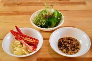 three bowls with pickling ingredients