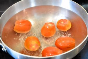 tomatoes dunked in boiling water