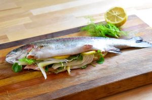 whole raw trout stuffed with lemon and fennel